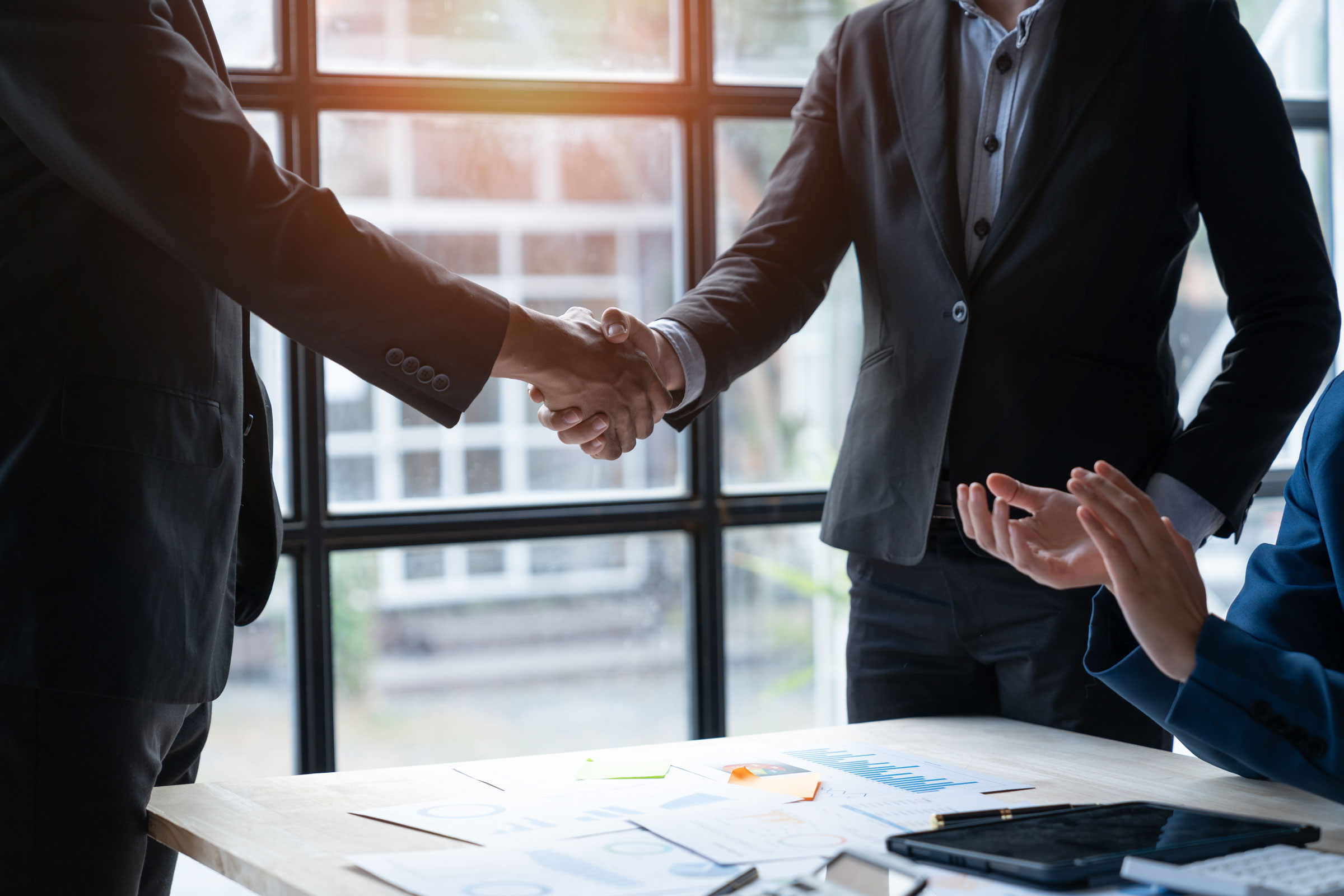 What are the differences between partnership agreements and joint ventures?